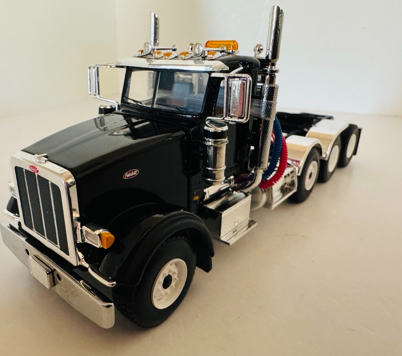 1:50 Black Peterbilt 367 Tri-Axle Day Cab Diecast Model By First Gear