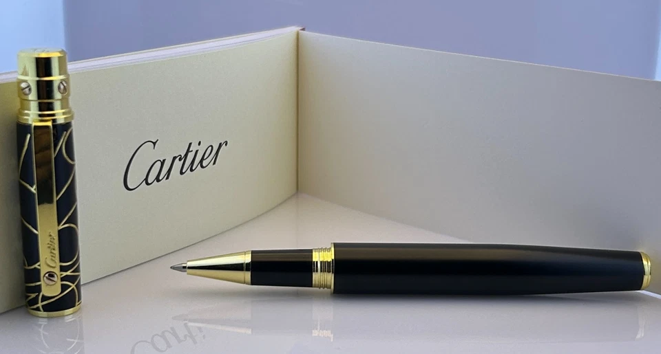 Bolígrafo Santos De Cartier {tinta azul} cuerpo de diseño de lujo negro y dorado Foto 4 de 4