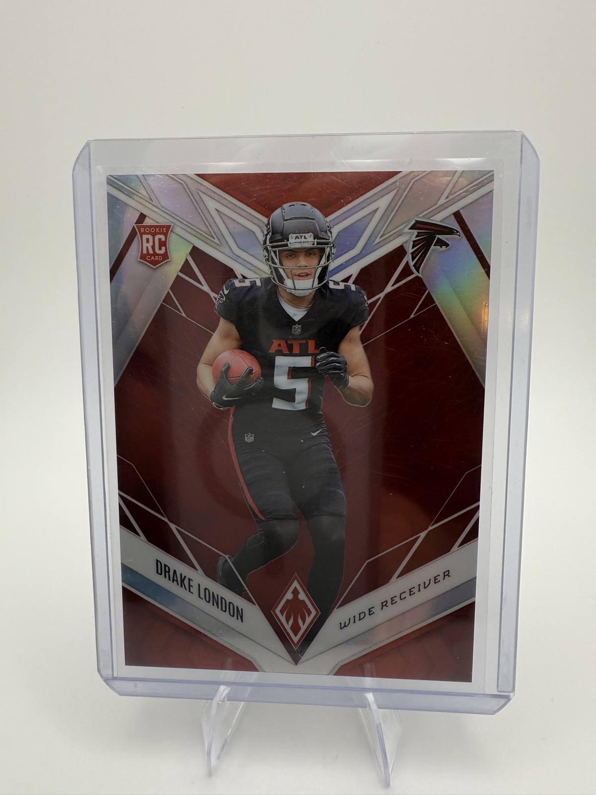 2022 Panini Phoenix Rookies Red /250 Drake London #107 Rookie RC