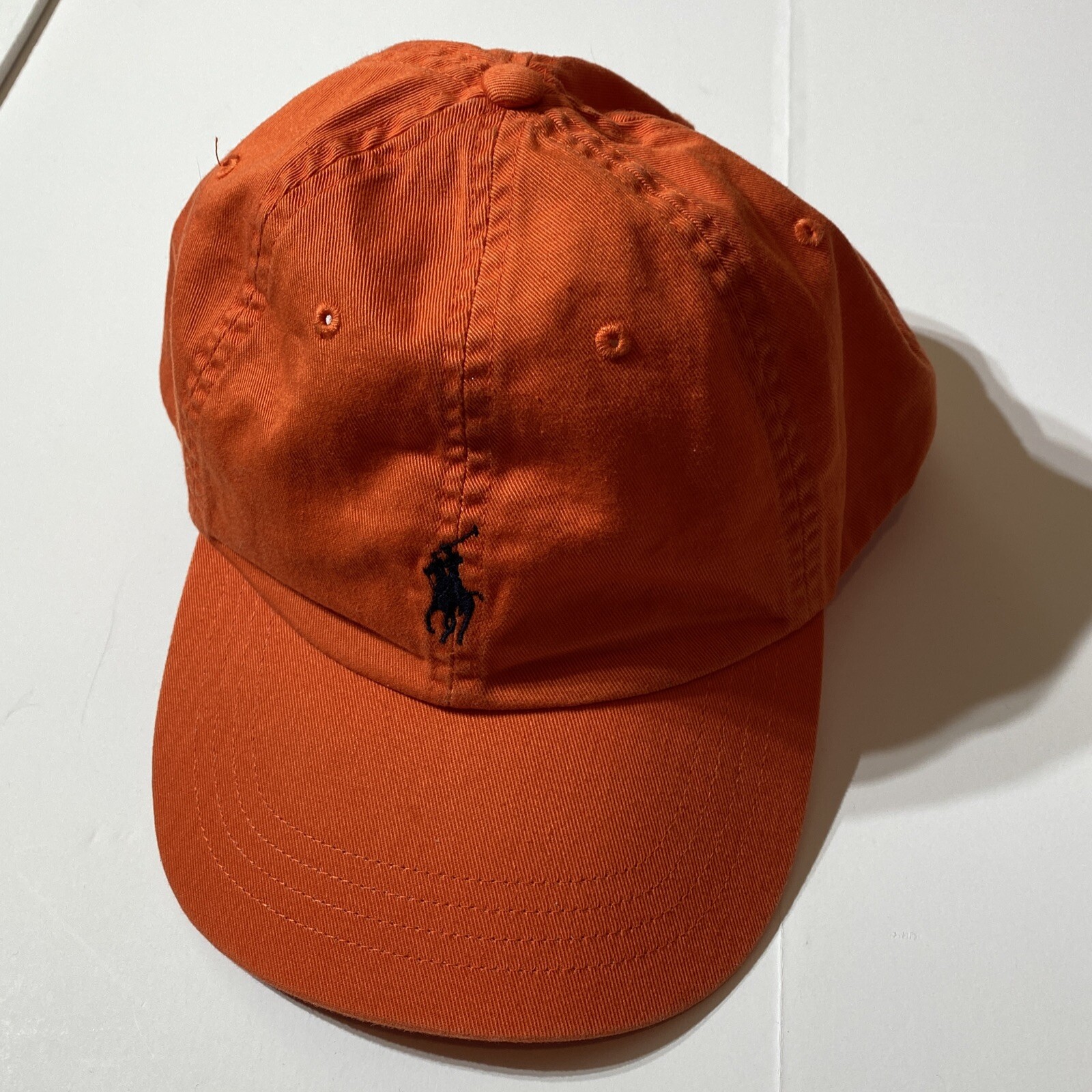 orange polo cap