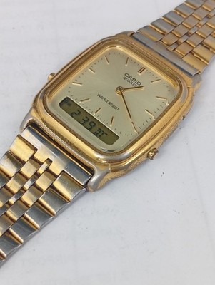 1980's Casio 306 AQ-307 Ana Digi Gold Tone Men'sGold Dial Watch
