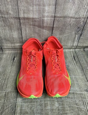 red nike track shoes