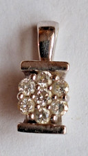 9ct White Gold 375, 0.15 Carat Diamond Flower Cluster Pendant Fully hallmarked.