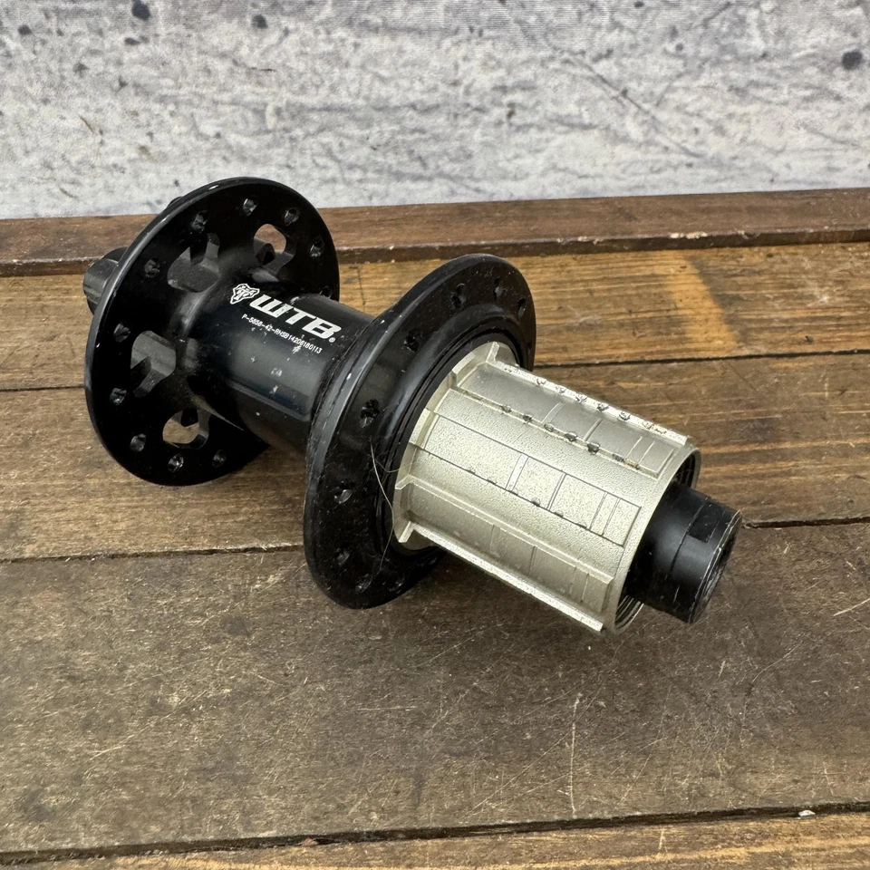 Buje trasero WTB 12mm 142 disco de 6 pernos 28h 28 Shimano HG buje libre MTB negro Foto 2 de 4