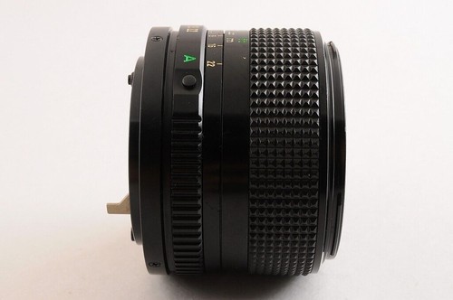 【CASI COMO NUEVO+】CANON NEW FD NFD 24mm F/2.8 MF Lens Cap + 1984 OLYMPIC... - Imagen 8 de 12