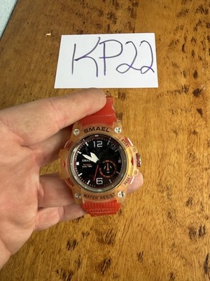 SMAEL 8007 sports watch with a red strap and a yellow-orange transparent case kp