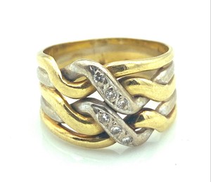 MAGNIFIQUE BAGUE OR 18 CARATS - Diamants 0,06 carat - 6,64 g