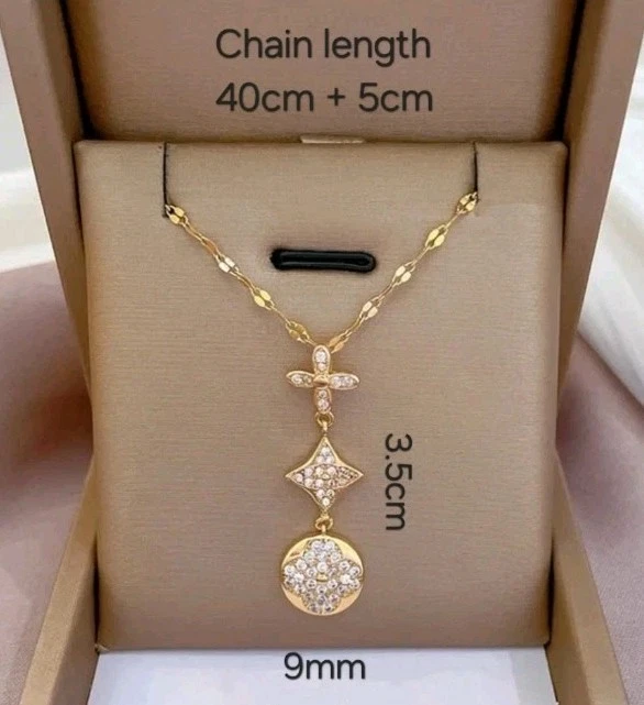 Collar con incrustaciones de diamantes de acero titanio geométrico minimalista trébol de flores triple Foto 4 de 4