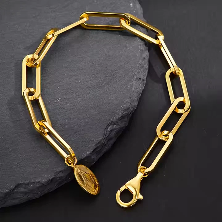 Pulsera de cadena con clip colgante religioso de oro de 18k sobre plata Foto 2 de 4