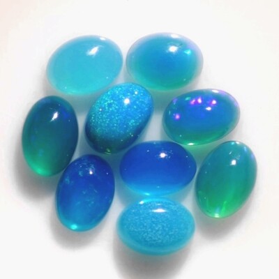 CARIBBEAN BLUE OPAL x MM OVAL CABOCHON SOLD PER STONE F-2742