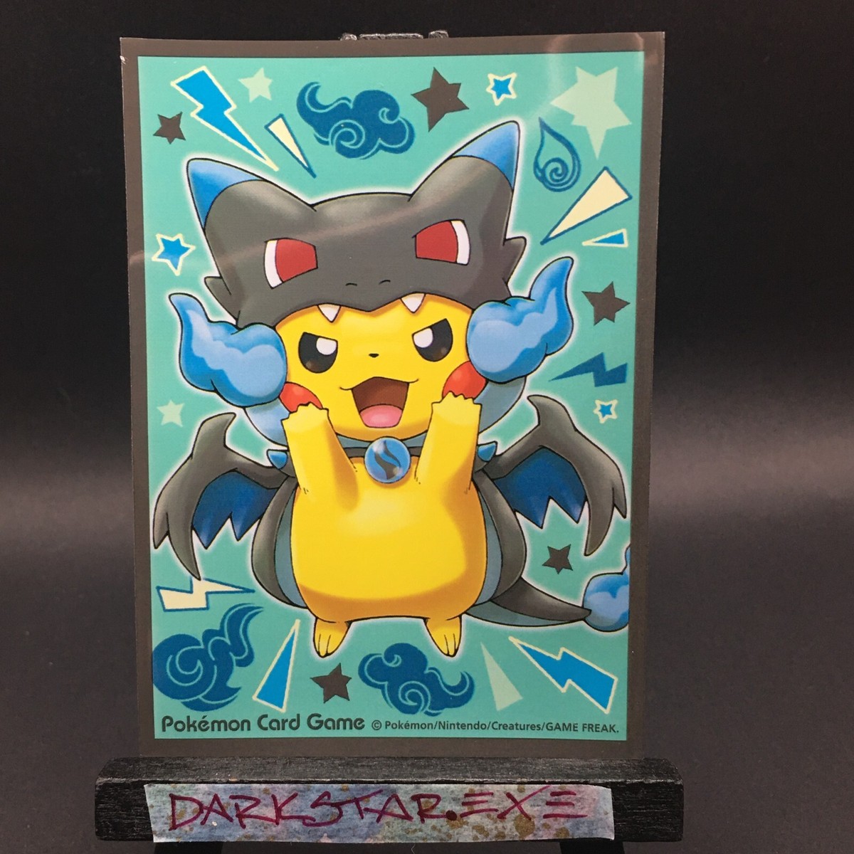 まゆの使ってたリザードン・まゆのピカチュウ・まゆのラッキー RESTOCK?)x1 Mega Charizard X Poncho Pikachu Sleeve Pokemon Center