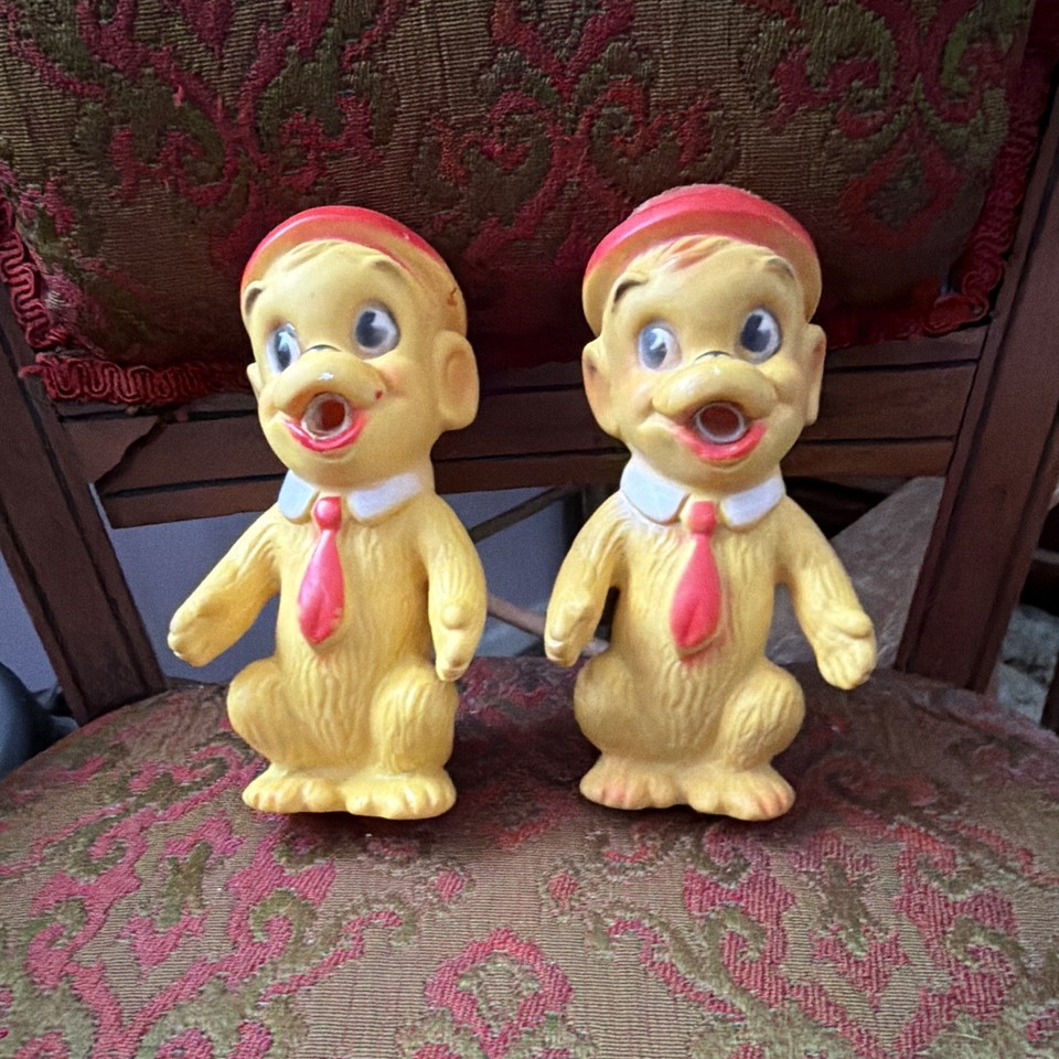 A pair of 1967 mid-century kitsch rubber squeak toys — the kind of charming, weird object that instantly becomes a shelf conversation piece.