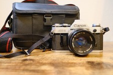 WORKING Canon AE-1 35mm SLR Film Camera with 50mm f1.8 Lens, Camera Bag Bundle