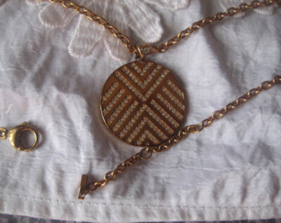 Fossil massives Collier, Kette in Gold mit rundem Anhänger und Zirkonia-Strahlen