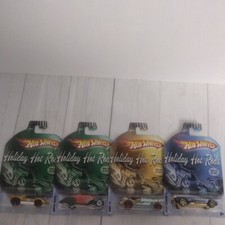HOT WHEELS Holiday Hotrods Set Of 4 New In Package 2009