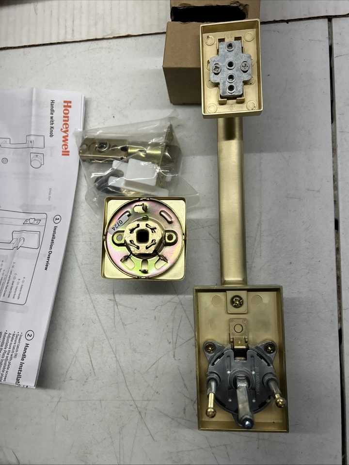 Manija de puerta de entrada interior/exterior oro satinado Honeywell 8120007 Foto 4 de 4