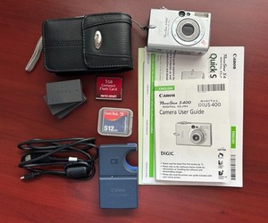Lots of Canon PowerShot Digital ELPH S400 Accessories and Camera