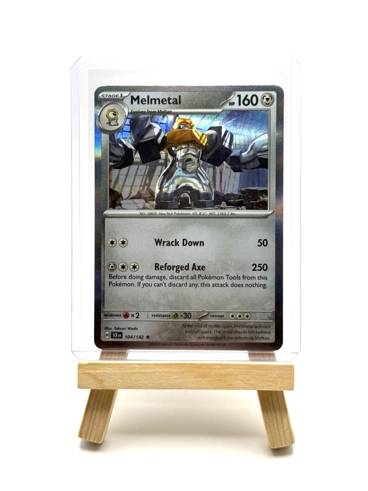 Melmetal Holo Rare - 104/142 - Stellar Crown Pokemon 2024 - NM/MINT