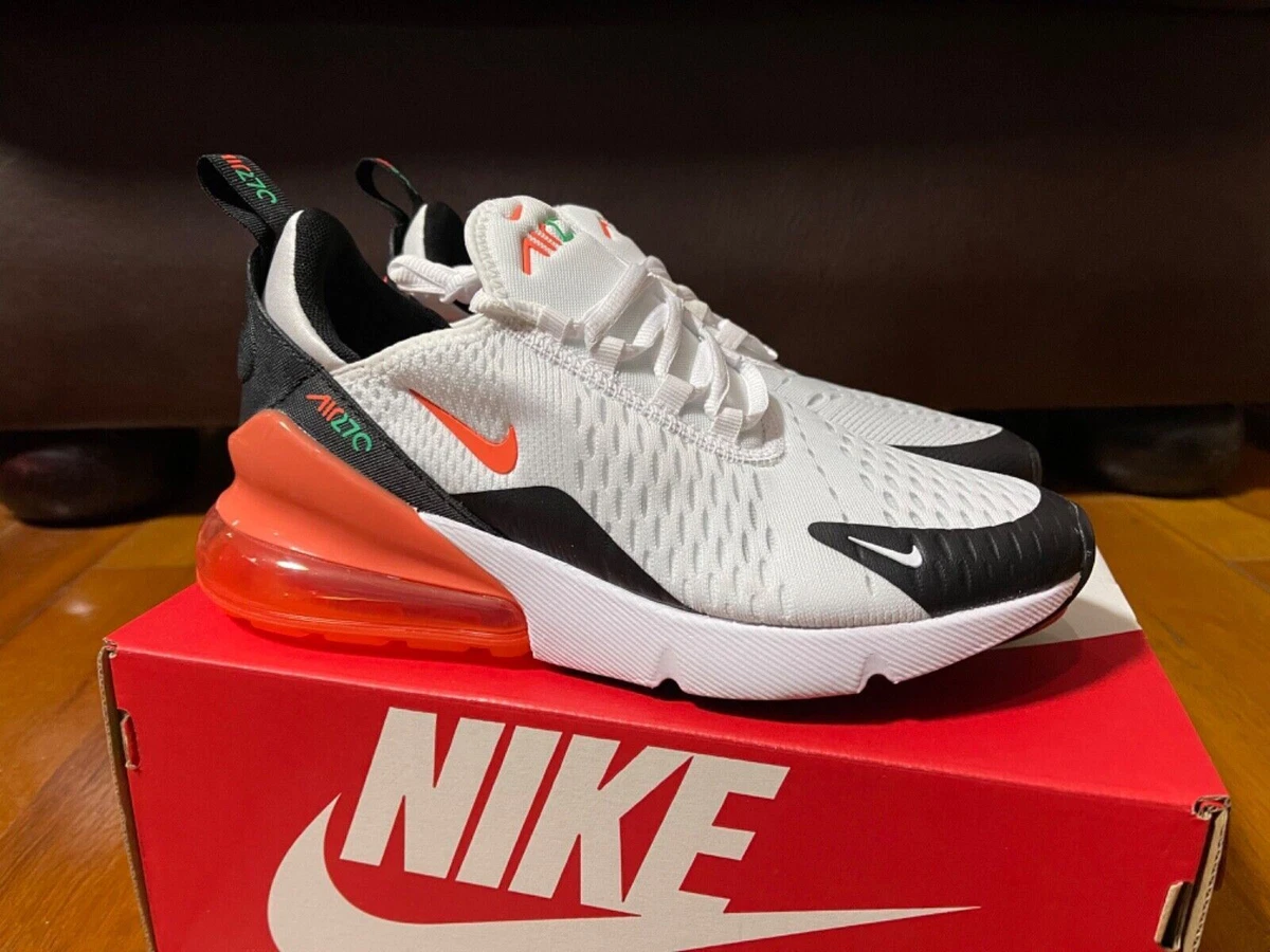 Nike white sales and orange shoes