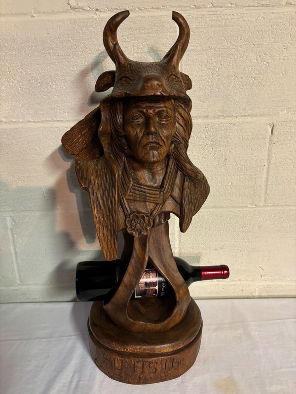 "HUNTS the CROOKED HORNS" WOODEN NATIVE AMERICAN STATUE