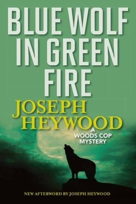 #ad Blue Wolf In Green Fire: A Woods Cop Mystery Woods Cop Mysteries VERY GOOD $6.56