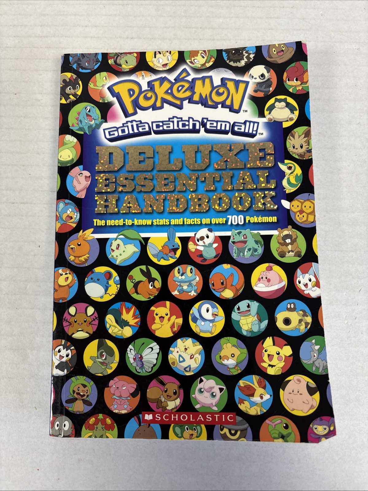 Pokemon Deluxe Essential Handbook  Scholastic 2015, Trade Paperback