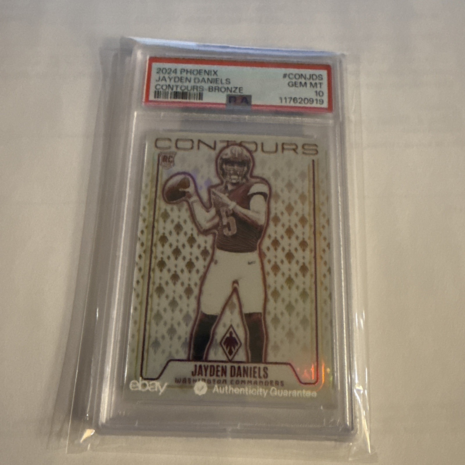 2024 Panini Phoenix - Contours Jayden Daniels #CON-JDS Bronze /75 (RC) PSA 10