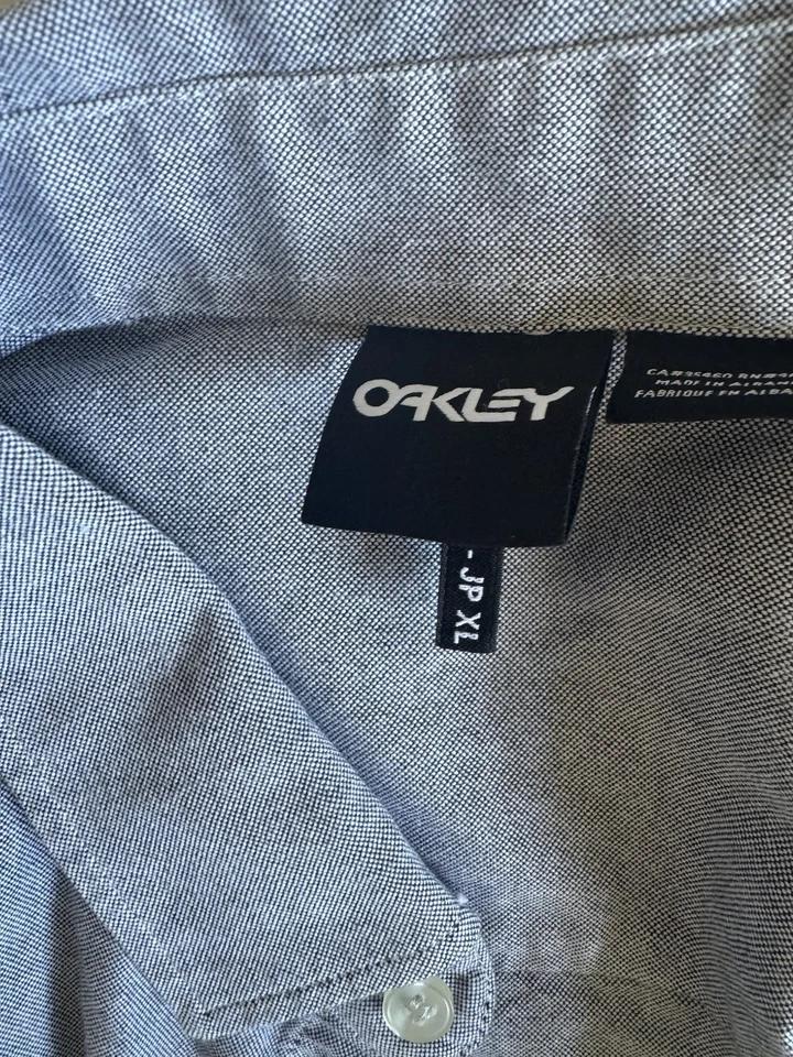 Camisa OAKLEY Para Hombres Manga Larga Gris Sólido Abotonada Talla Grande Bolsillos con Cremallera Foto 3 de 3