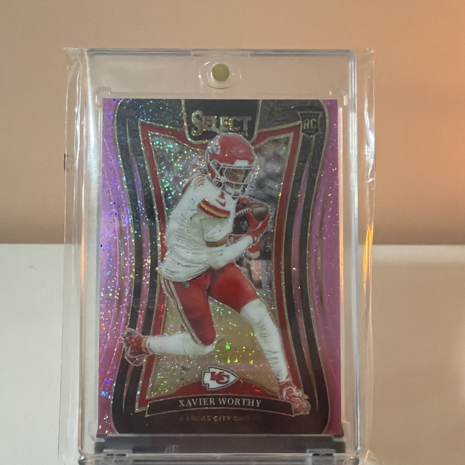2024 Panini Select - Suite Level Xavier Worthy- Pink Glitter Prizm /15 (RC)