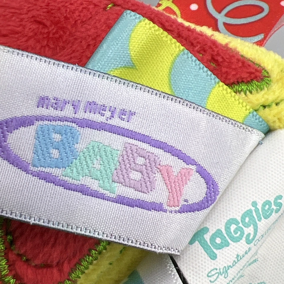 Детская игрушка погремушка 5 дюймов полицейский автомобиль самосвал Taggies Wheelies Mary Meyer - Изображение 4 из 4