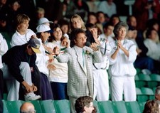 Cliff Richard performs on Centre Court during a rain delay at the - Old Photo 1