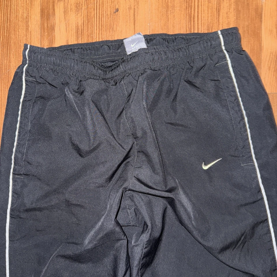 Pantalones de chándal vintage Y2K Nike negros y grises para hombre talla pequeña holgados pierna ancha Foto 3 de 4