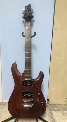 Schecter Diamond Series OMEN-6 Model  Walnut Electric Guitar W/ Gig Bag. USED.