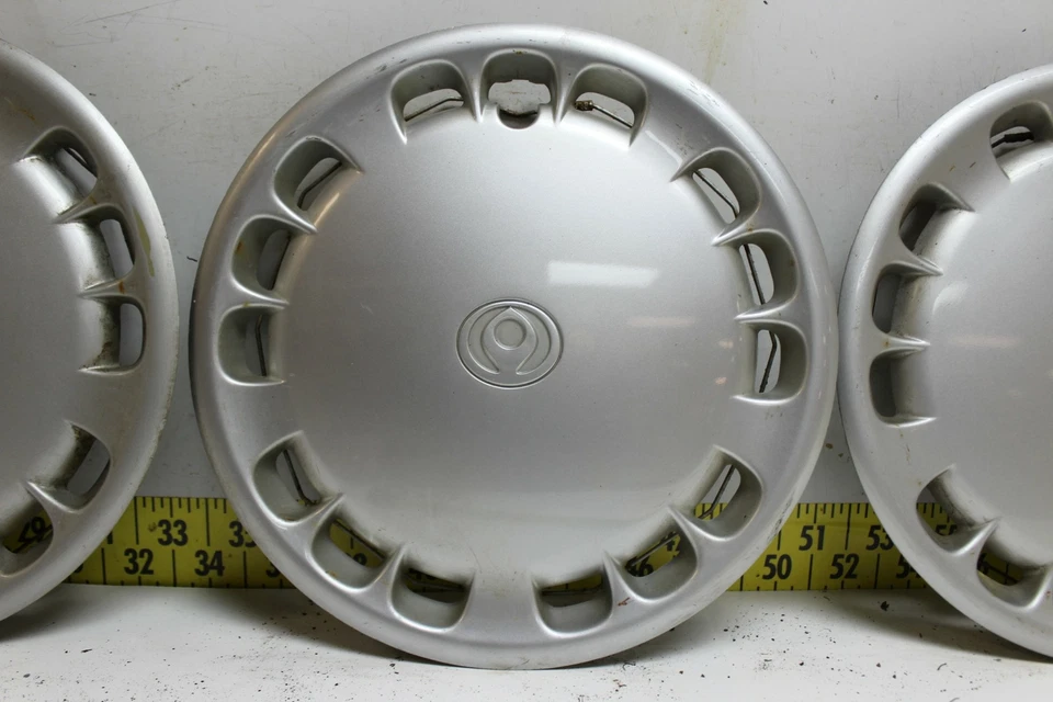 Juego de 4 tapacubos de 14" usados OEM GA2K37170B 1993-1997 Mazda 626 (3436) Foto 4 de 4