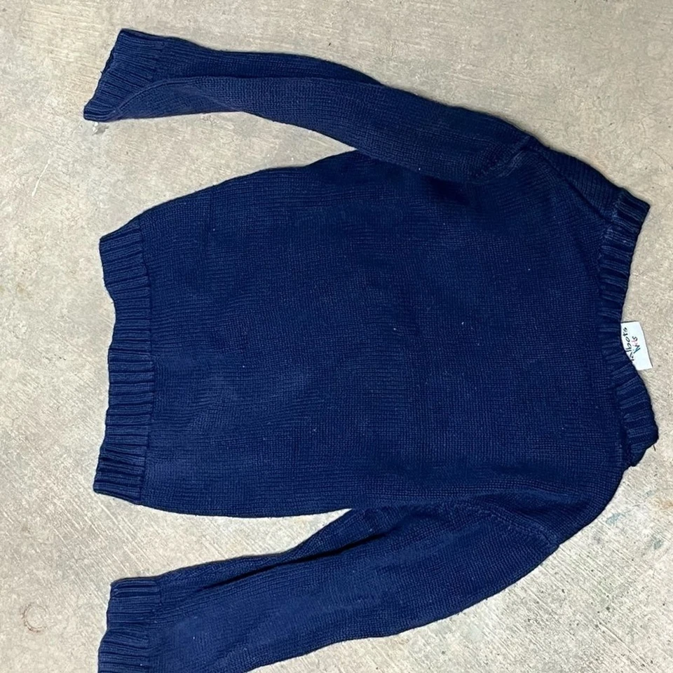 Suéter azul marino con diseño de estrella plateada para niñas Foto 3 de 3