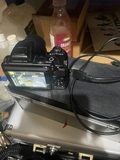 Nikon COOLPIX L310 14.1MP Digital Bridge Camera 21x Optical Zoom.