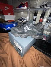 New Balance 9060 Men’s 8-13 Available, Triple Black.