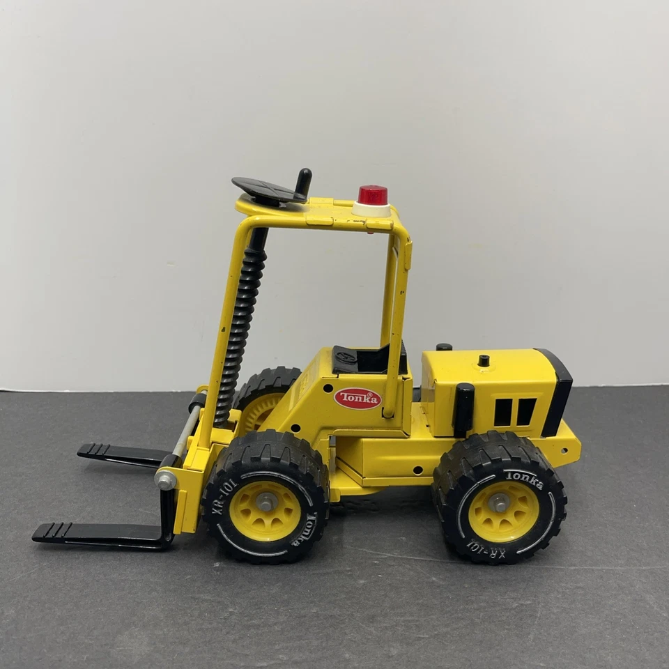 Винтажный вилочный погрузчик Tonka из прессованной стали 52900 (1743) - Изображение 3 из 4