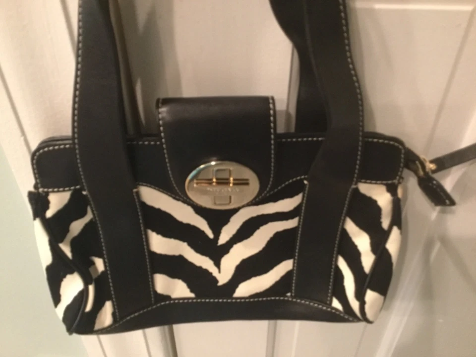 Kate Spade Zebra Print Black and White Print handbag with Black Leather Trim.