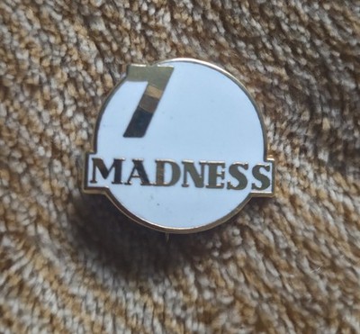 Madness 7 White & Gold Pin Badge