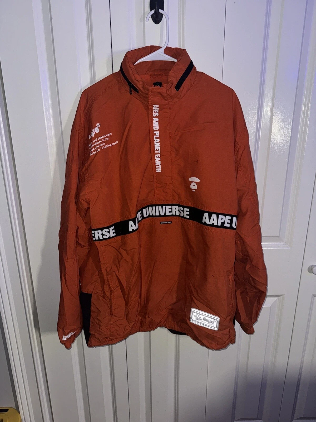 A BATHING APE (BAPE) Giacca con cappuccio A Bathing Ape Ape Rompivento ""Scimmie e pianeta terra"" arancione XL
