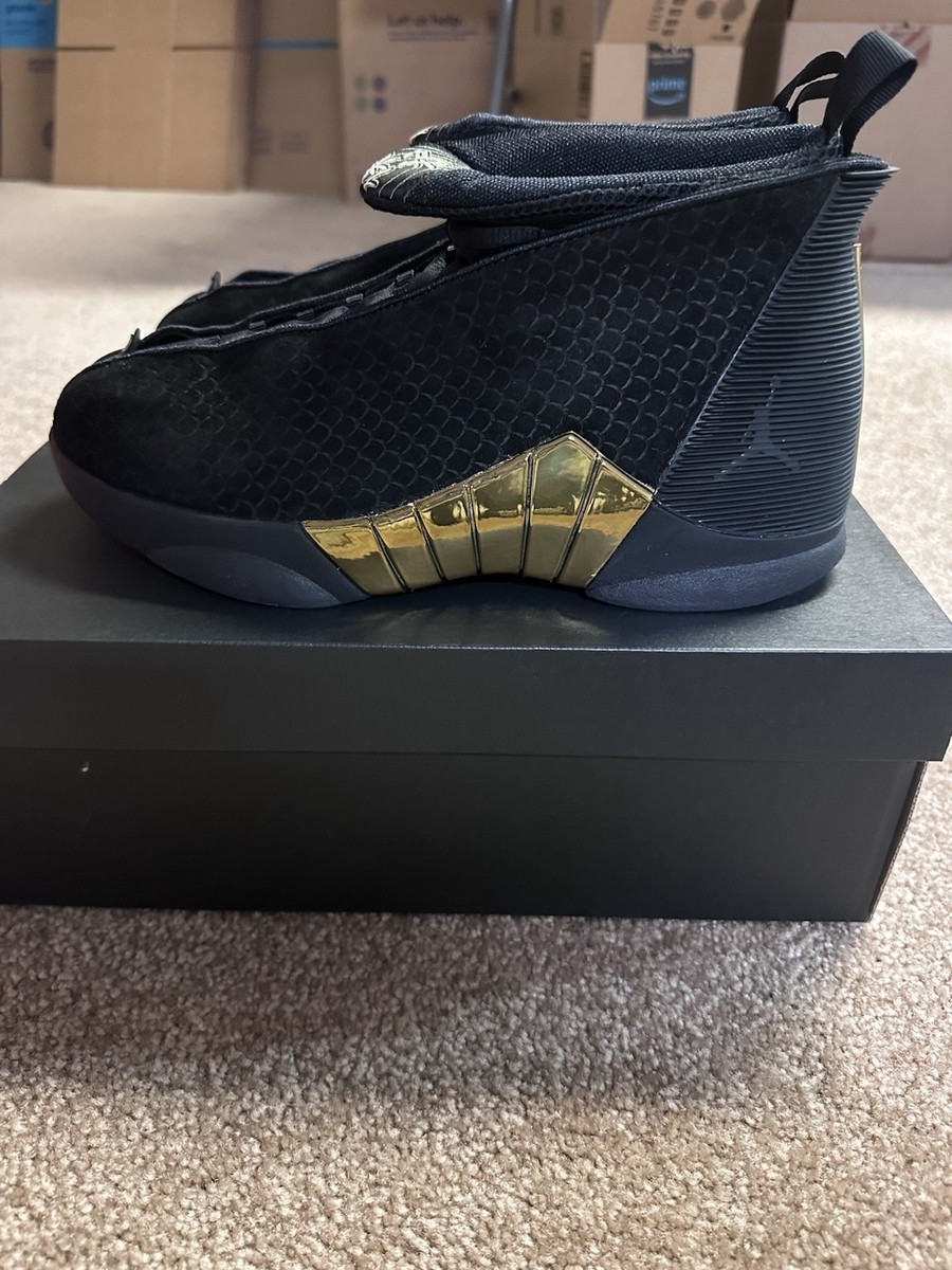 jordan 15 gold and black