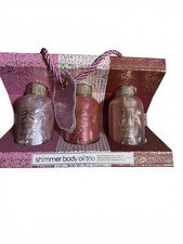 Coty Shimmer Body Oil Trio - Vanilla Sugar, Cherry Blossom, and Tahitian Vanilla
