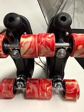 Sure-Grip Twister Indoor Quad Roller Skates Black Boots Red/White Wheels