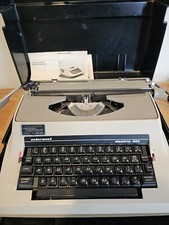 Vintage Undrewood Electric 555 Typewriter with Original Manual and Case thumbnail