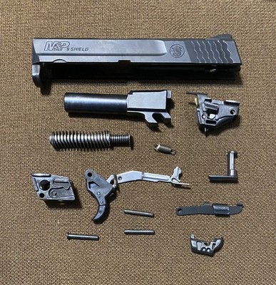 Used OEM Smith & Wesson M&P 9 Shield in 9mm Manual Thumb Safety Parts Lot