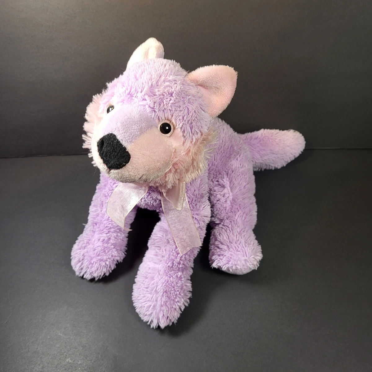 Purple wolf plush deals