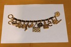 Chanel 1995 icon 12 charms gold chain with leather center bracelet — photo 2