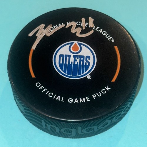 ZACH HYMAN Signed Edmonton OILERS Official GAME Puck Beckett (BAS)