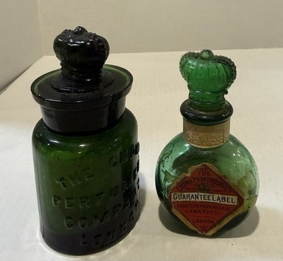 Labeled The Crown Perfumery Company London.  Two Perfume Bottles